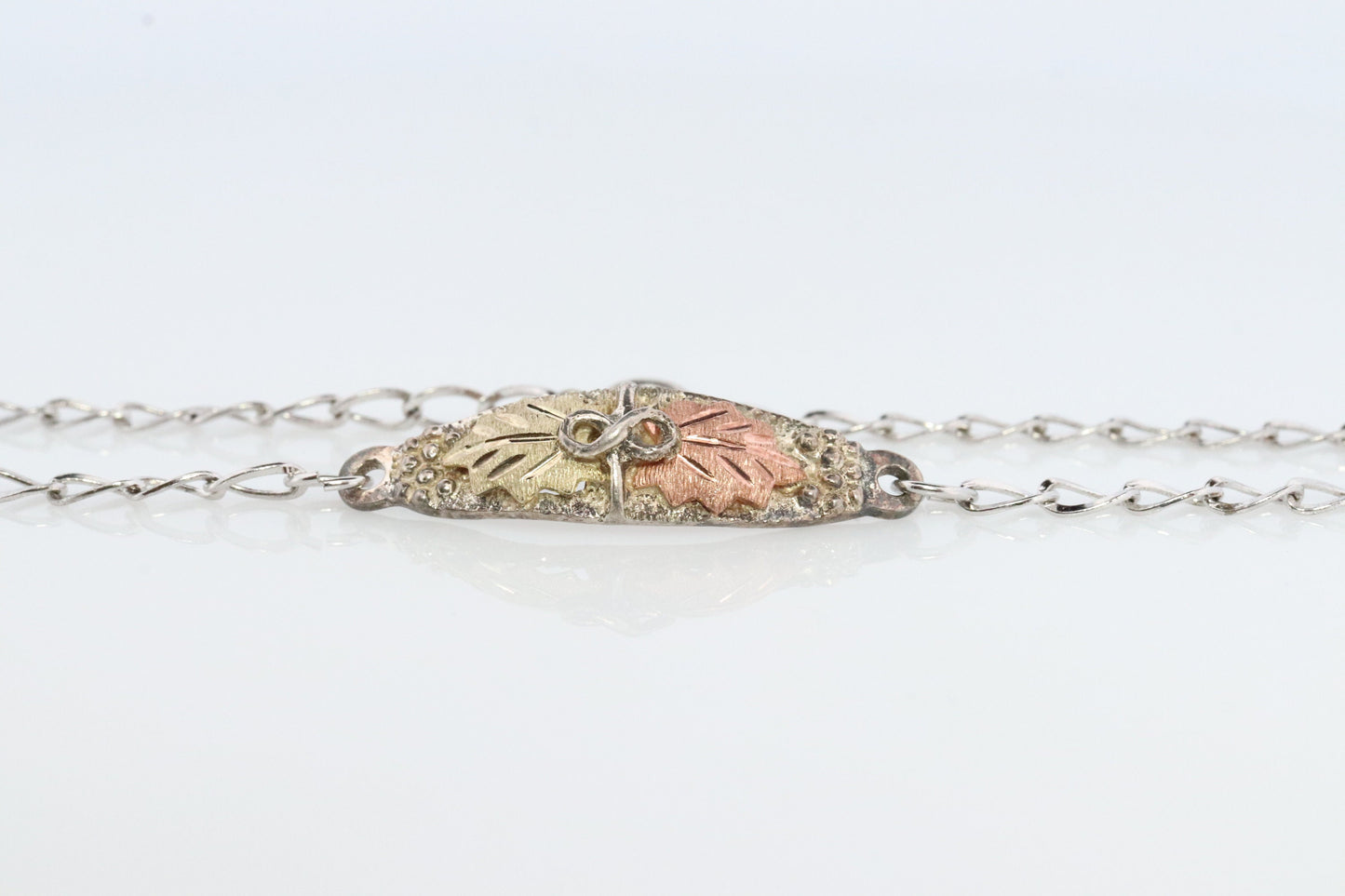 Black Hills Gold Bracelet. STERLING SILVER with 10k Multi-Tone Black Hills Gold Bracelet. Name Tag Design.