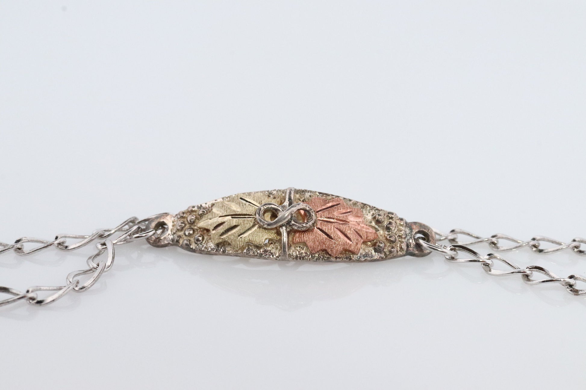 Black Hills Gold Bracelet. STERLING SILVER with 10k Multi-Tone Black Hills Gold Bracelet. Name Tag Design.