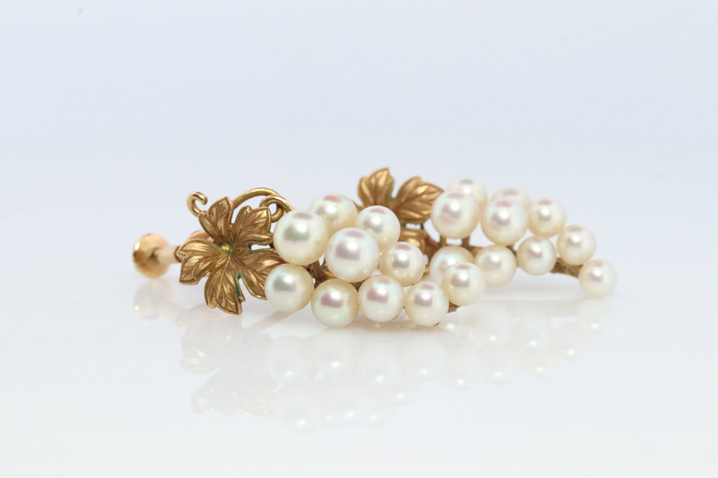 14k MIKIMOTO earrings. Vintage Mikimoto Akoya pearl screw back earrings. Grape vine bunch leaf unpierced clip earrings.