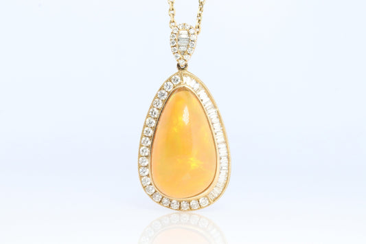 Opal and Diamond Halo 14k pendant. Large Natural Pendant Surrounded by Baguette and Round Diamonds. Pear Opal Cabochon. Appraised.