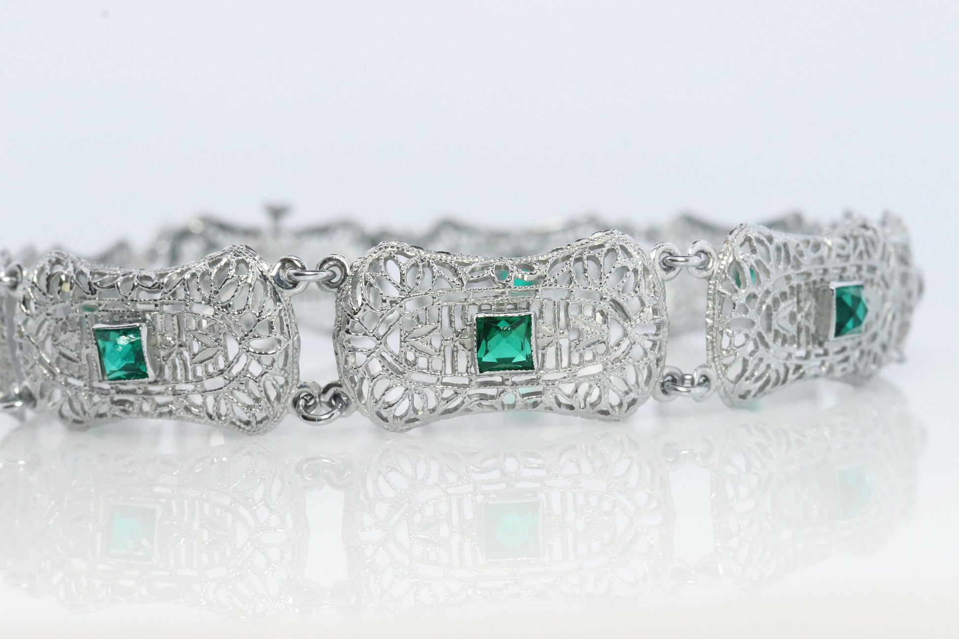 10k Art Deco Filigree Bracelet. Open Scroll link Princess Emerald bracelet. Art Deco Intricate Delicate Shield Bracelet.