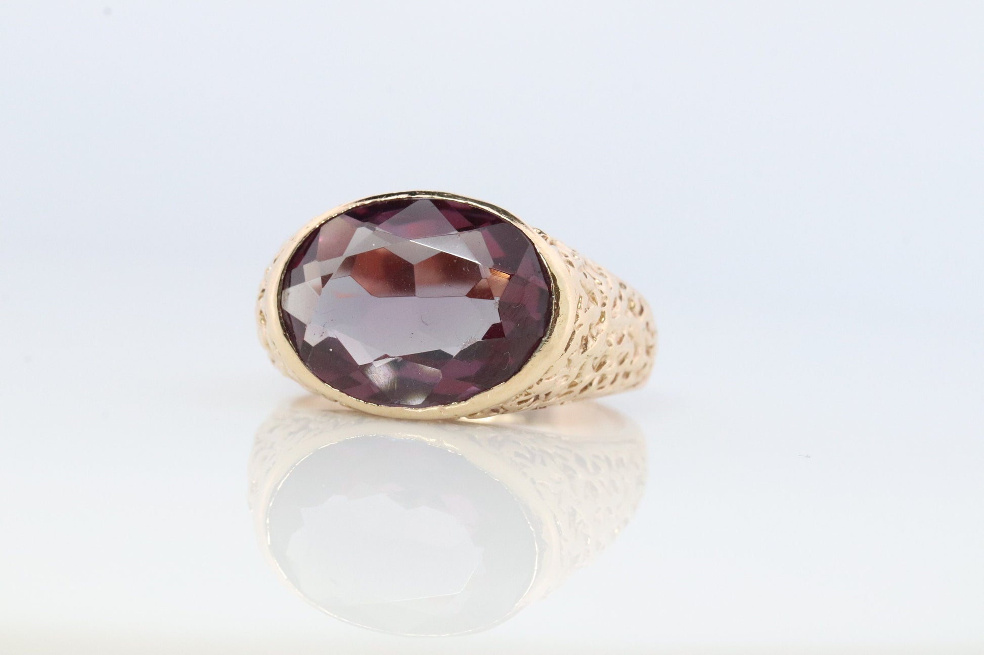 Alexandrite Ring. 14k Gold Heavy Bezel setting oval cabochon faceted ALEXANDRITE ring.