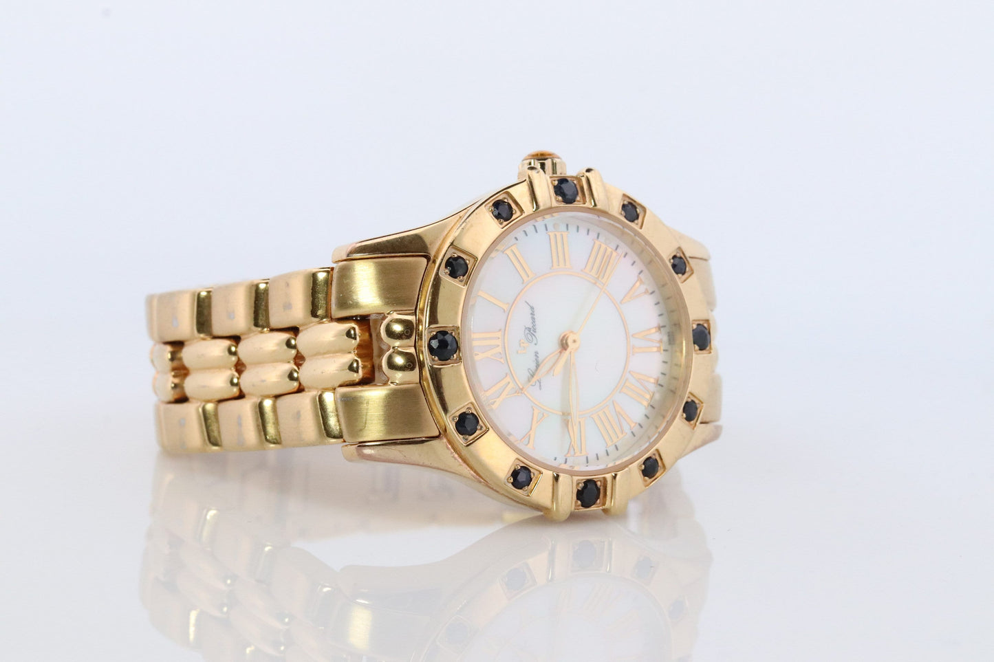 Lucien Piccard watch Ladies. Stainless Steel Gold Tone with Sapphires and MOP Face. Women's Lucien Piccard watch.