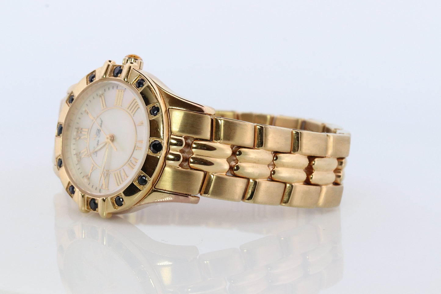 Lucien Piccard watch Ladies. Stainless Steel Gold Tone with Sapphires and MOP Face. Women's Lucien Piccard watch.
