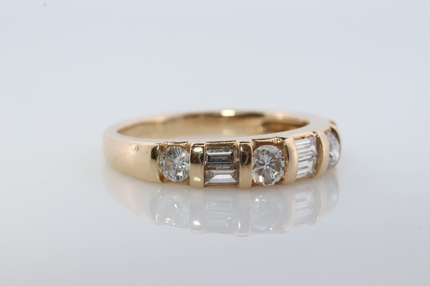 Diamond Band. 14k Yellow Gold with round and Baguette diamonds channel set cluster. 1ctw