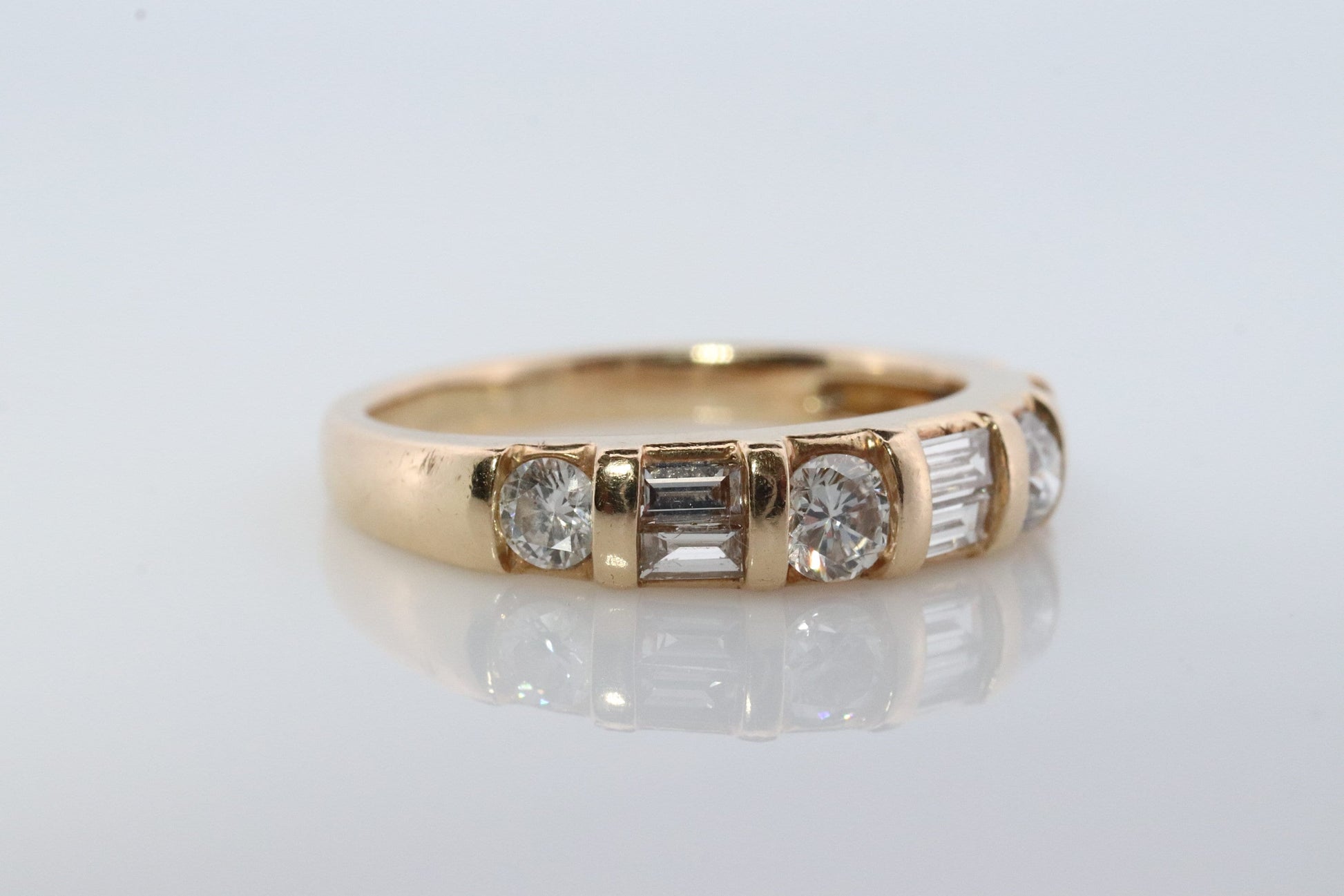 Diamond Band. 14k Yellow Gold with round and Baguette diamonds channel set cluster. 1ctw