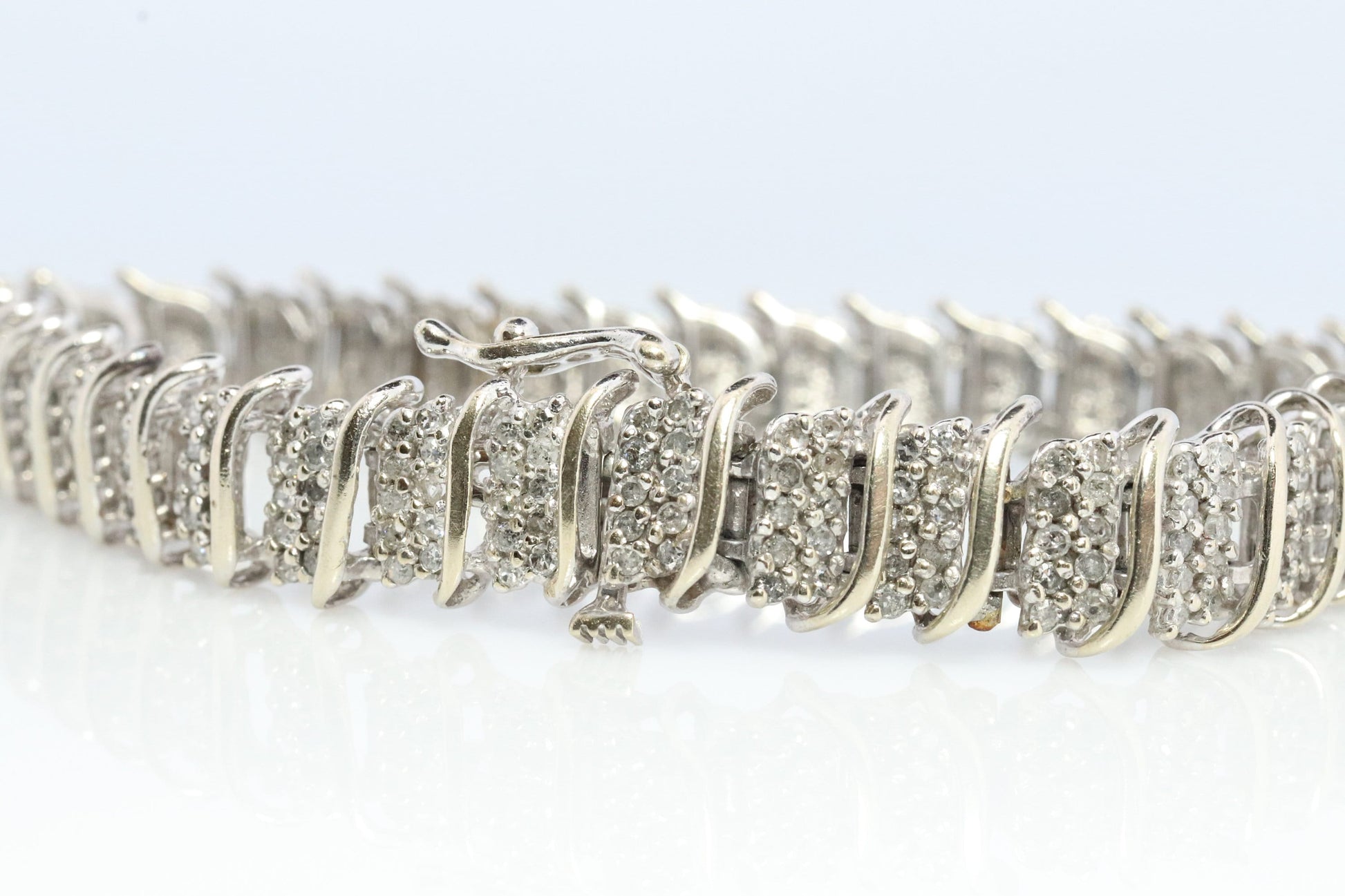 10k Diamond Tennis Bracelet. 10k S-LINK round diamond cluster Tennis bracelet. 2CTW JAFA wide tennis bracelet.