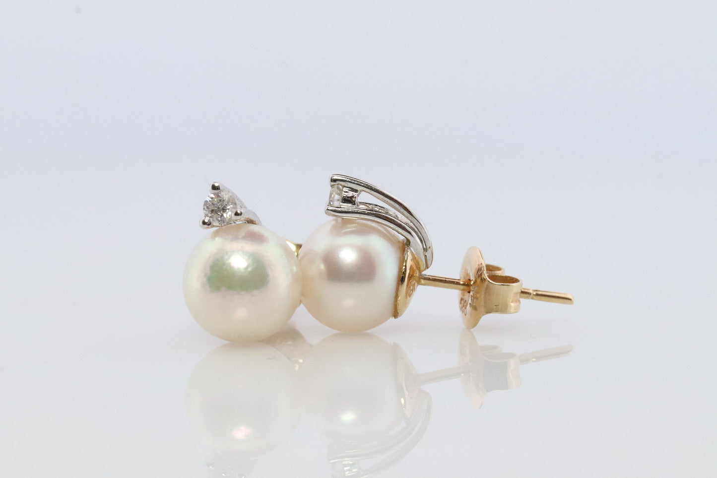 14k Pearl and Diamond stud earrings. Elegant and Dainty Pearl diamond studs.