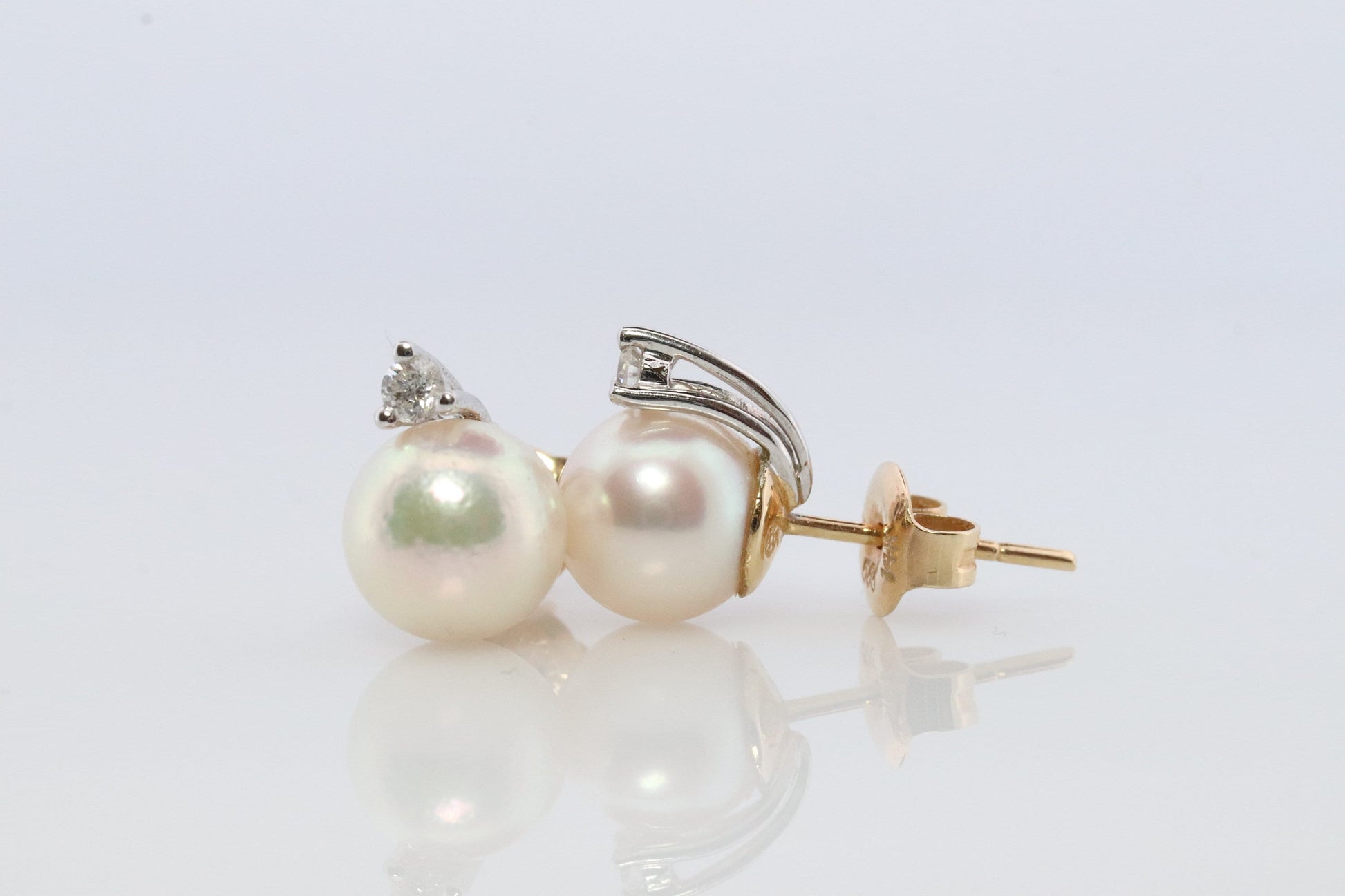 14k Pearl and Diamond stud earrings. Elegant and Dainty Pearl diamond studs.