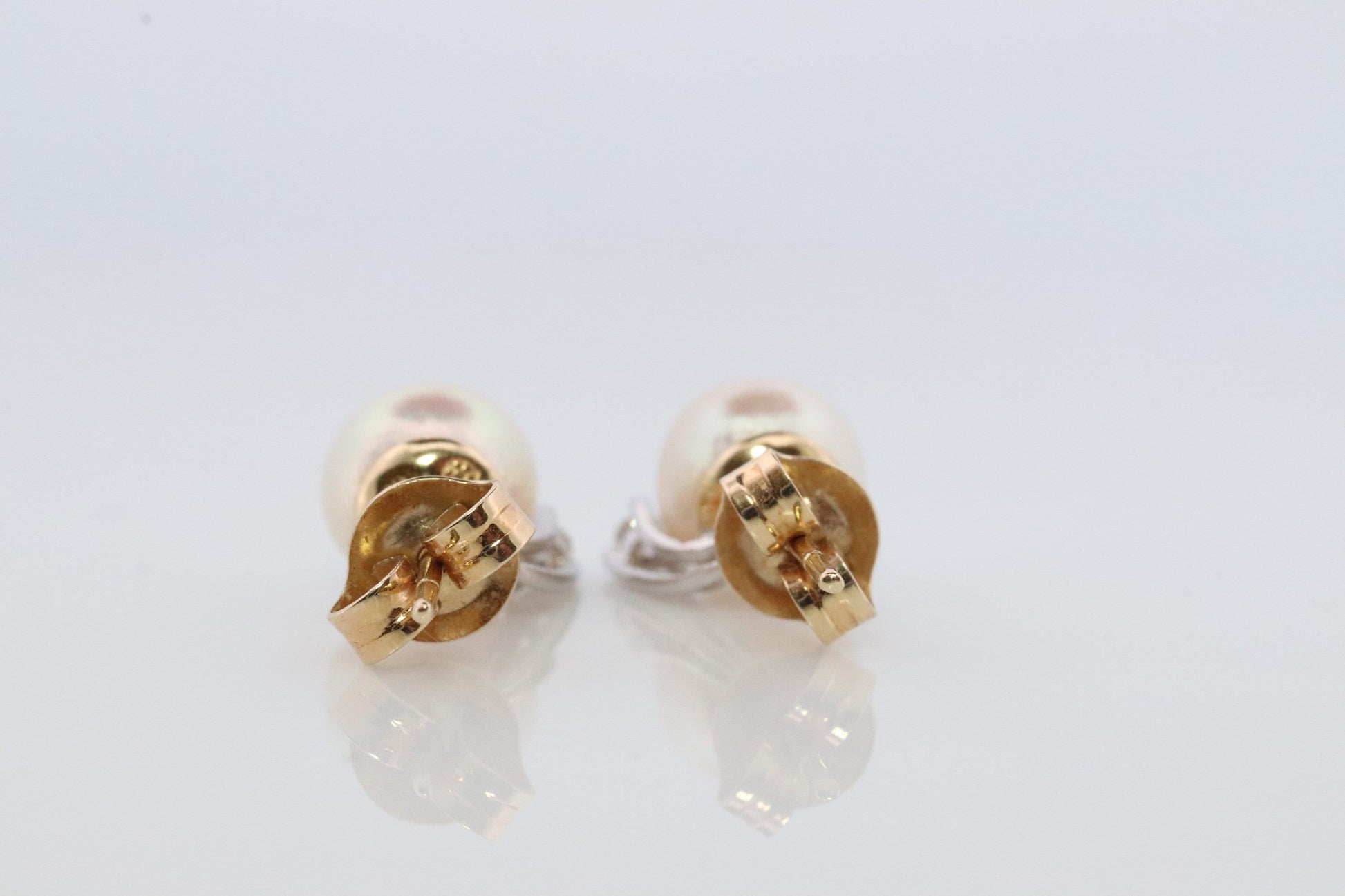 14k Pearl and Diamond stud earrings. Elegant and Dainty Pearl diamond studs.