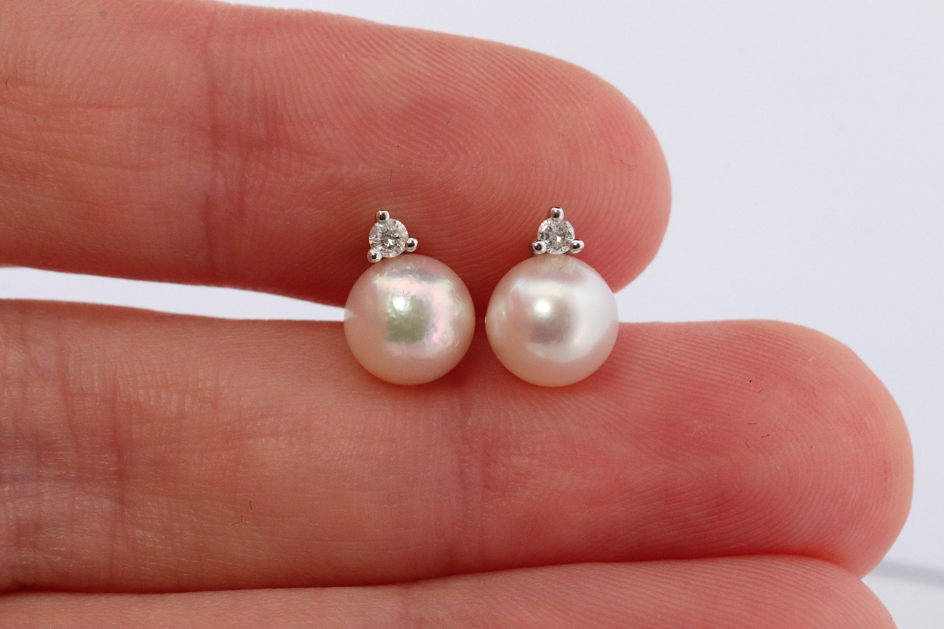 14k Pearl and Diamond stud earrings. Elegant and Dainty Pearl diamond studs.