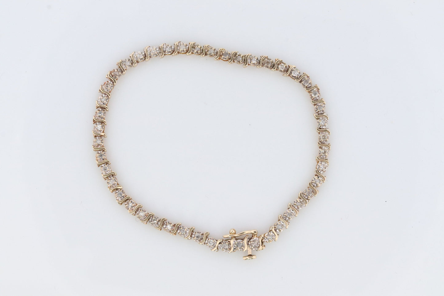 14k Diamond Tennis Bracelet. 14k S-LINK round diamond Tennis bracelet.