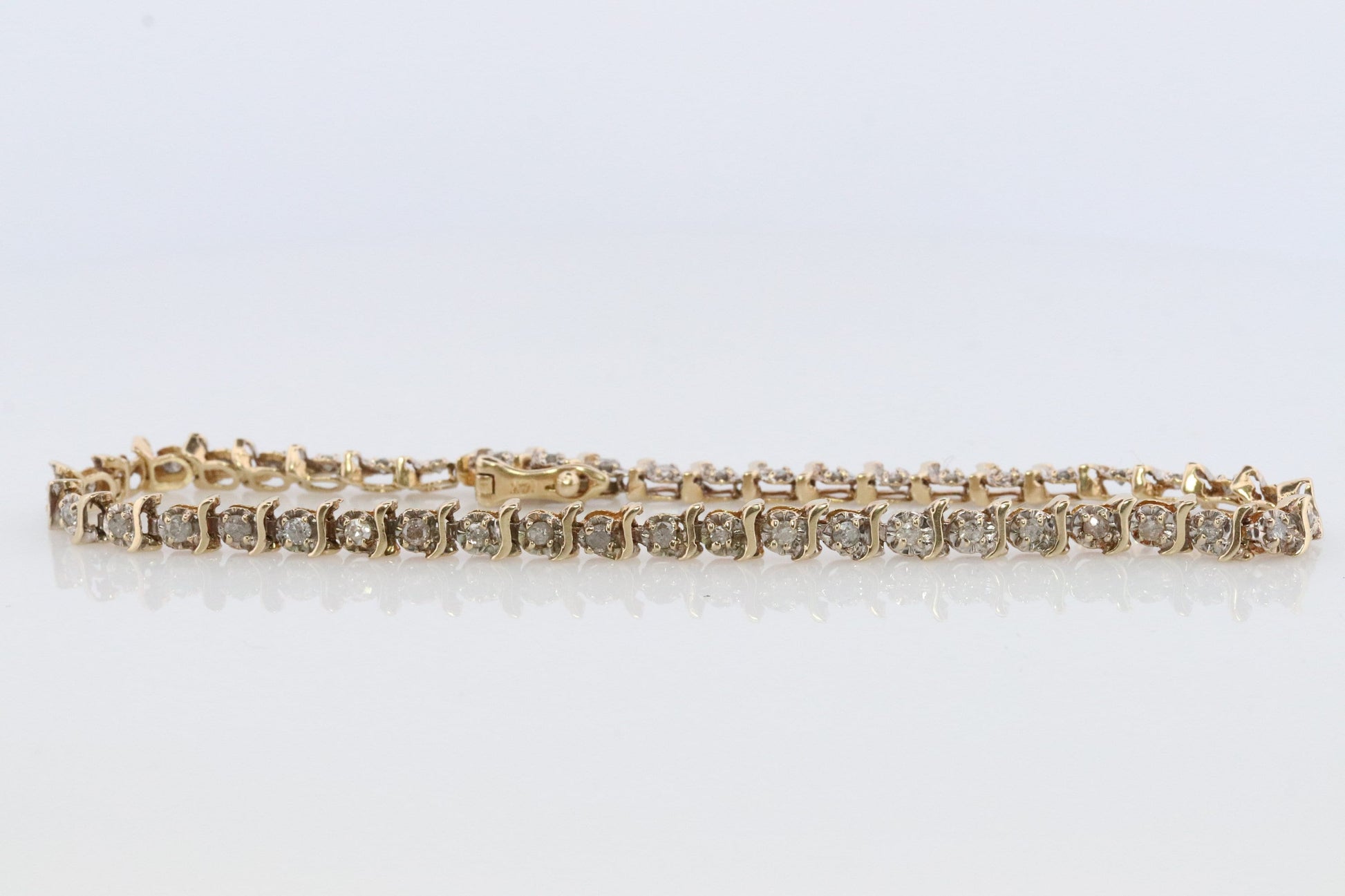 14k Diamond Tennis Bracelet. 14k S-LINK round diamond Tennis bracelet.