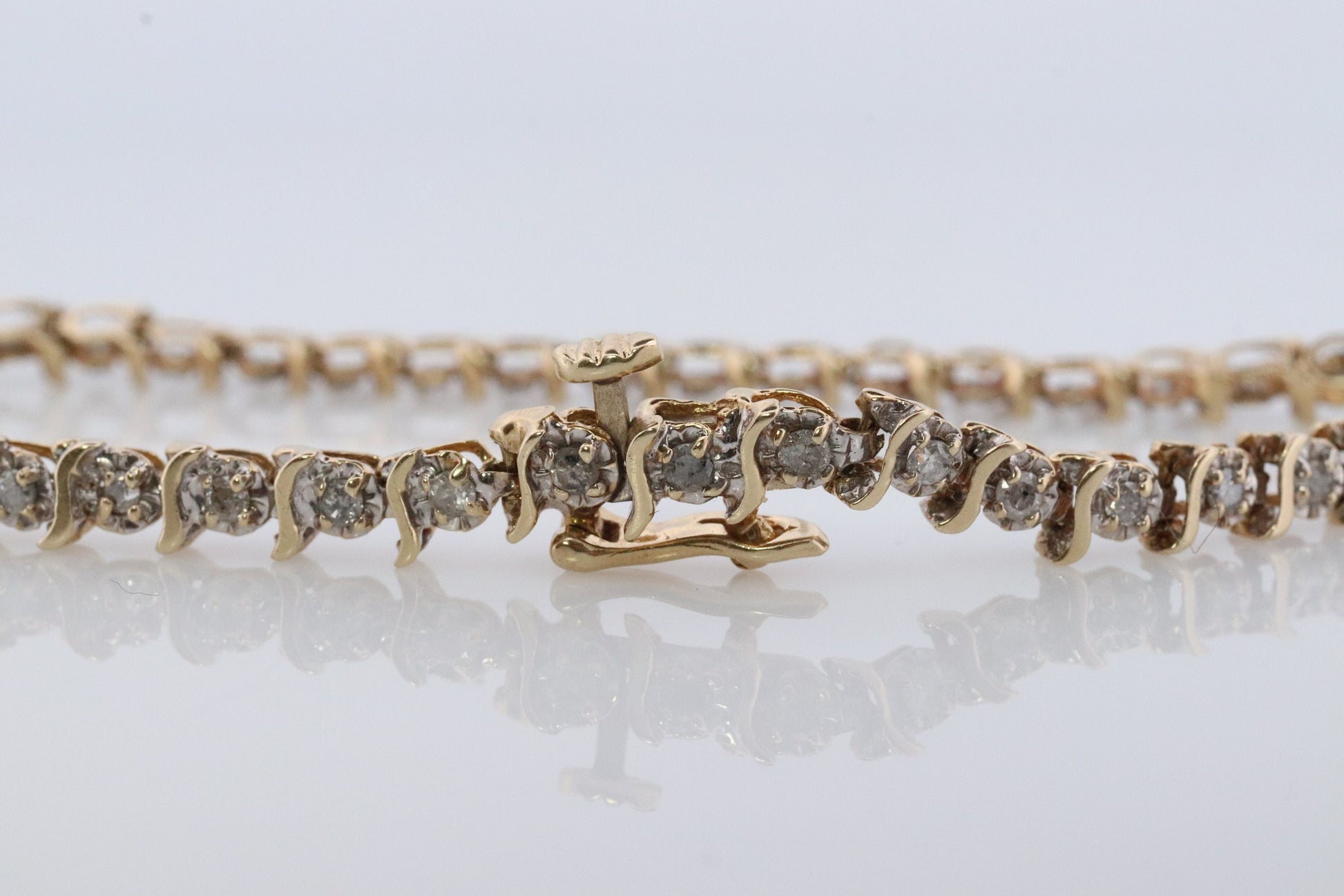 14k Diamond Tennis Bracelet. 14k S-LINK round diamond Tennis bracelet.