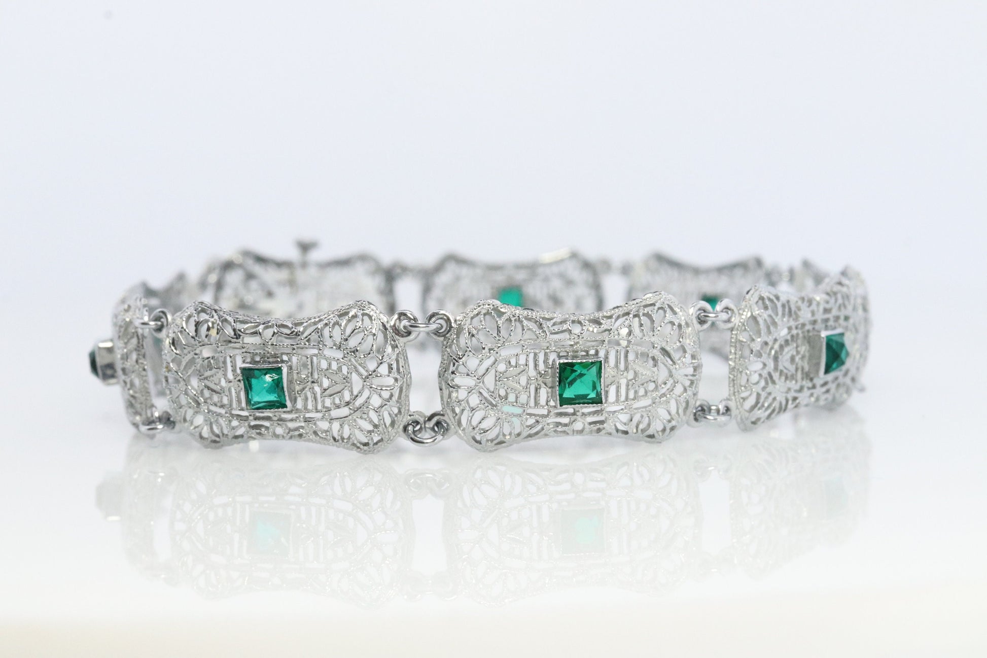 10k Art Deco Filigree Bracelet. Open Scroll link Princess Emerald bracelet. Art Deco Intricate Delicate Shield Bracelet.