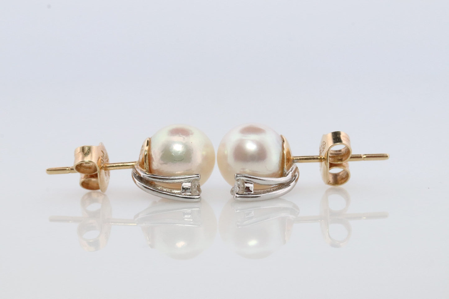 14k Pearl and Diamond stud earrings. Elegant and Dainty Pearl diamond studs.