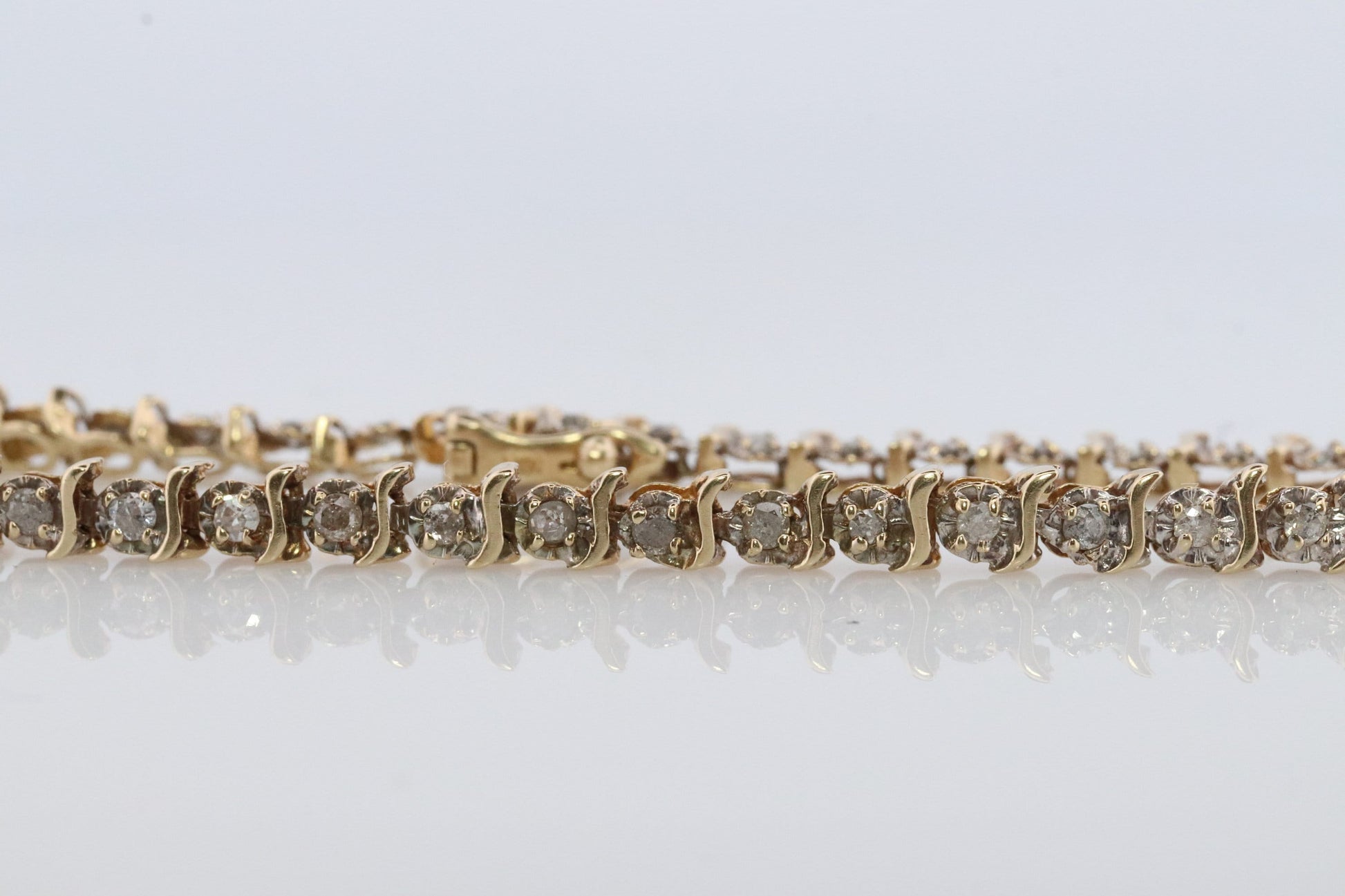 14k Diamond Tennis Bracelet. 14k S-LINK round diamond Tennis bracelet.