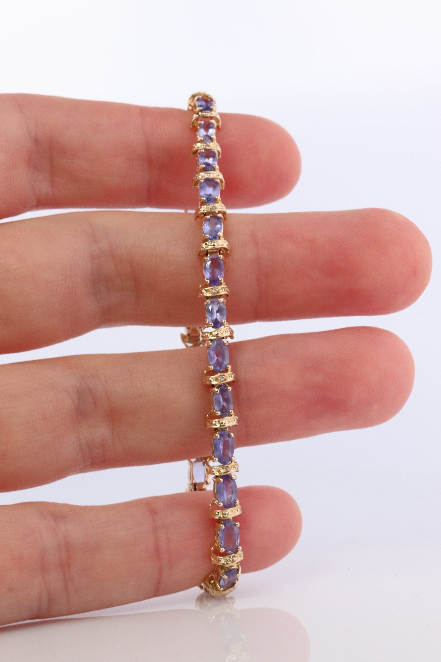 14k Tanzanite Tennis Bracelet. 14k Yellow Gold oval Tanzanite Bracelet. 14k Tanzanite alternating Bracelet.