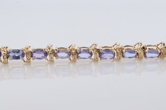 14k Tanzanite Tennis Bracelet. 14k Yellow Gold oval Tanzanite Bracelet. 14k Tanzanite alternating Bracelet.