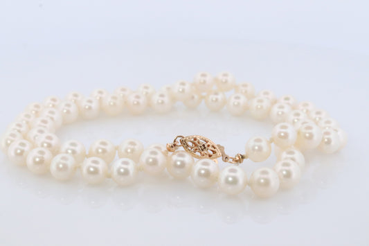 14k Akoya Pearl Necklace. 18in length 7mm AKOYA pearls with beautiful lustre.