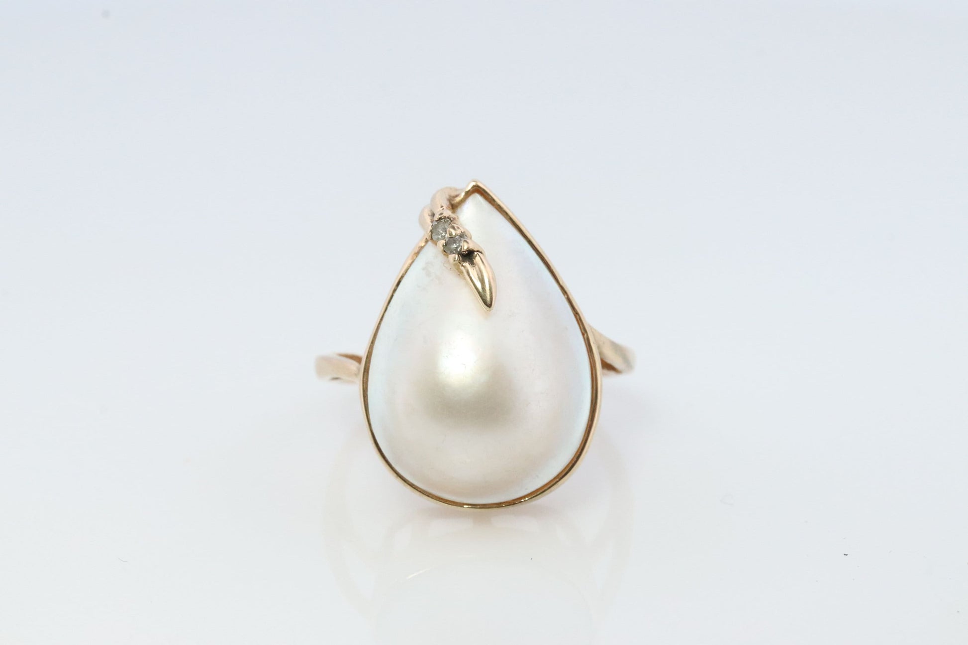 14k Large Mabe and Diamond Ring. Pear Mabe Pearl Solitaire ring with Diamond accents. IWI Imperial World Inc.