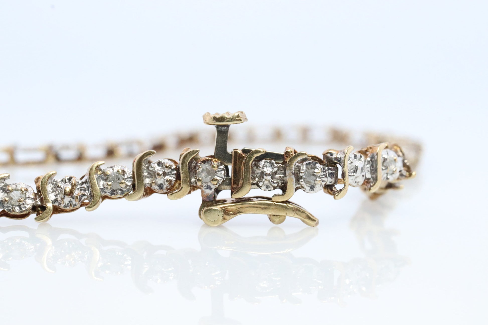 10k Diamond Tennis Bracelet. 10k S-LINK round diamond Tennis bracelet.
