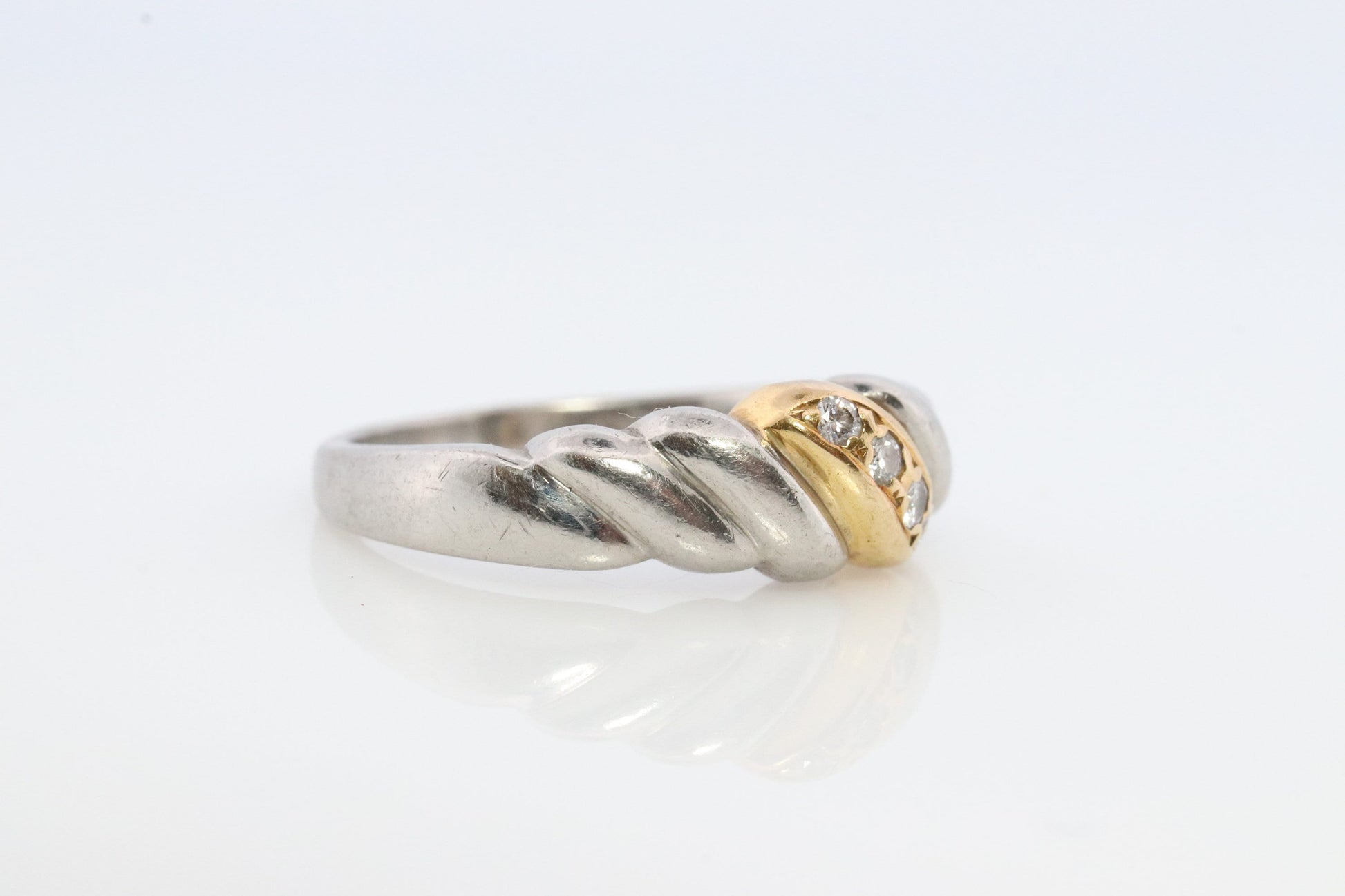 Mikimoto Ring. Vintage Platinum 18k Mikimoto Diamond Bezel set ring. Mikimoto Diamond Twist Bombe band. Mikimoto PT900. Wedding band