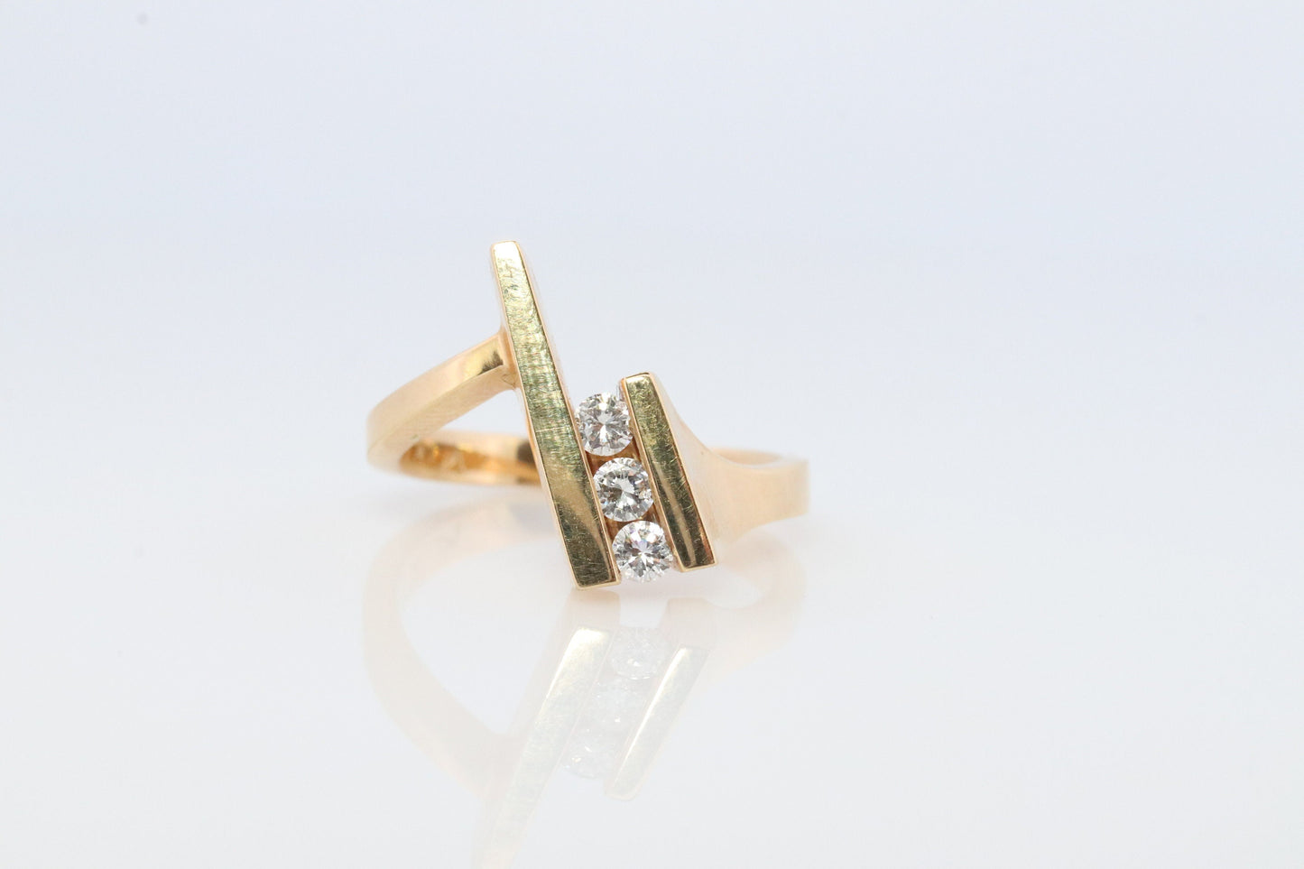 14k diamond tension set Eternity bypass ring. 14k Diamond Graduating infinity band #1057