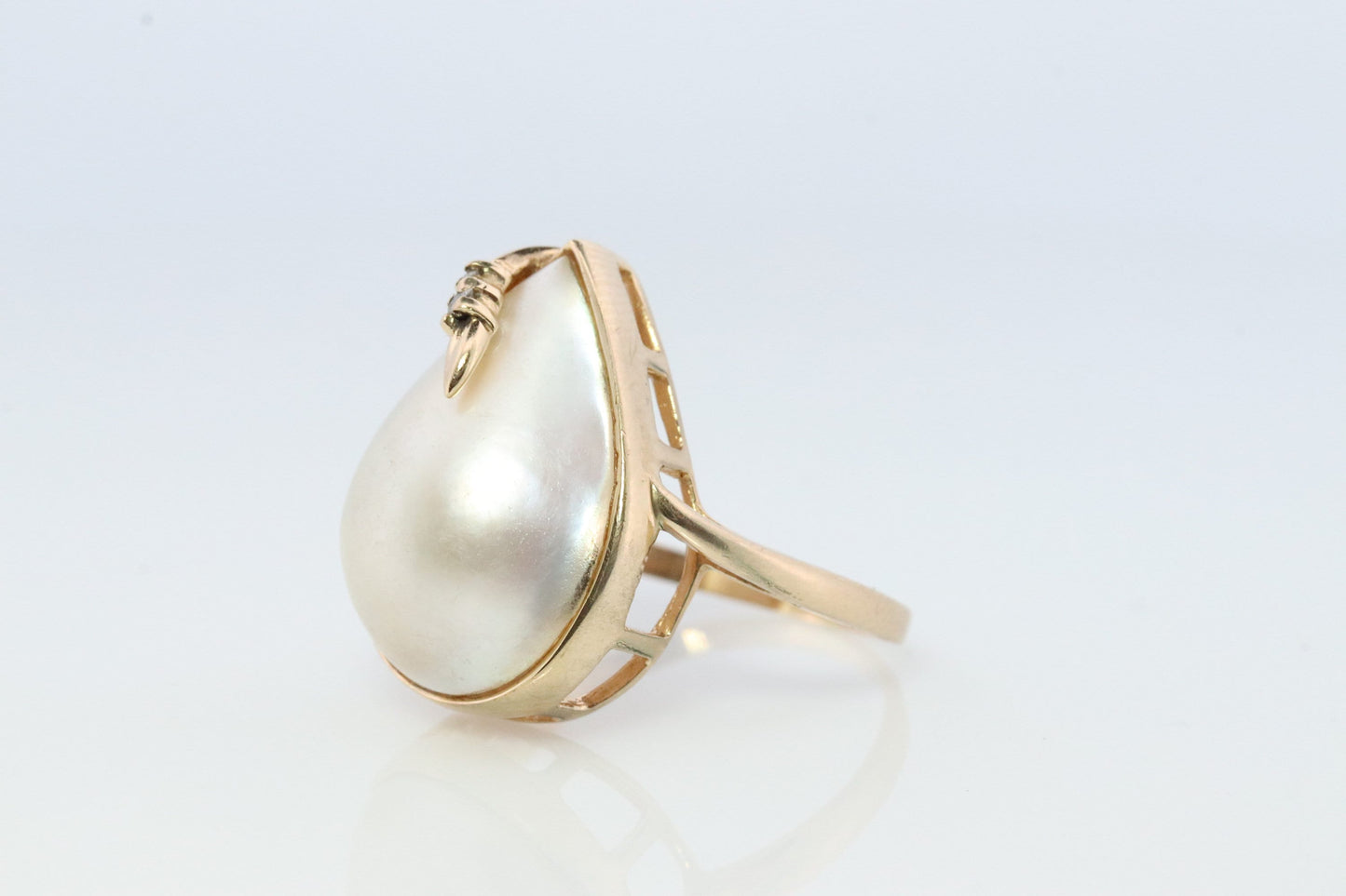 14k Large Mabe and Diamond Ring. Pear Mabe Pearl Solitaire ring with Diamond accents. IWI Imperial World Inc.