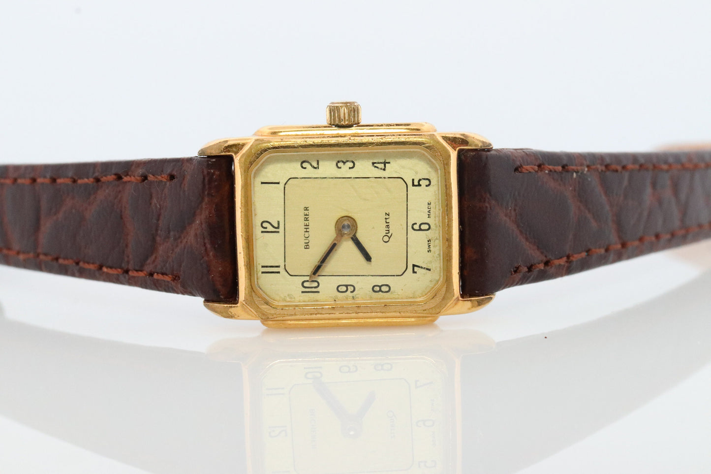 Bucherer Quartz wristwatch. Gold-tone bezel SWISS battery watch. Minimalist design. Serviced. Model 40171 Dp