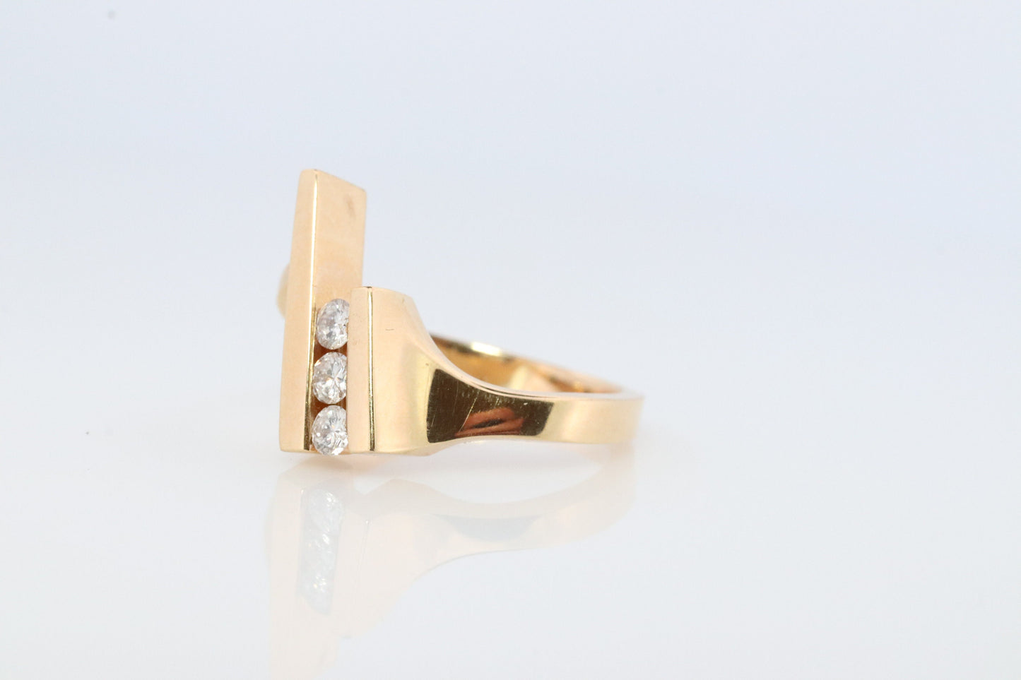 14k diamond tension set Eternity bypass ring. 14k Diamond Graduating infinity band #1057