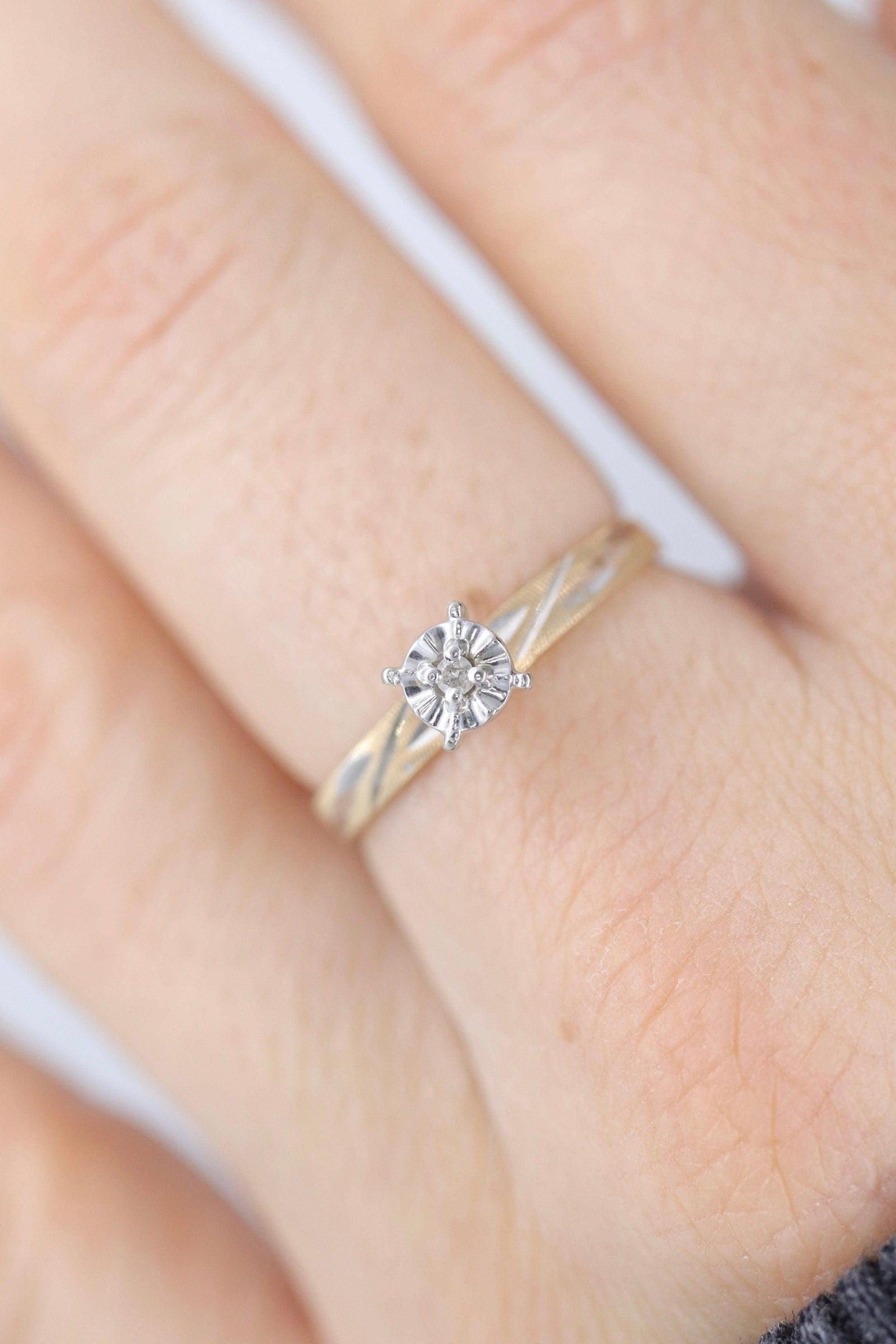 10k Diamond Solitaire. 10k Yellow gold engraved illusion set diamond ring.