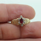 10k Ruby and Diamond HALO ring. 10k Yellow Gold Ribbed shank Ruby Halo ring.