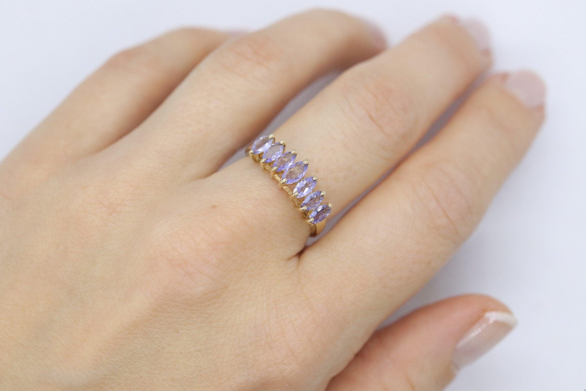 10k Tanzanite Marquise Anniversary ring. 7 stone Tanzanite band. Journey Band
