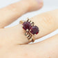 10k Victorian Claw Set Ruby Ring. Twin gem bypass bow ring.