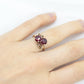 10k Victorian Claw Set Ruby Ring. Twin gem bypass bow ring.