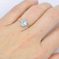 10k Aquamarine Topaz Solitaire Ring. 10k yellow gold band ring.