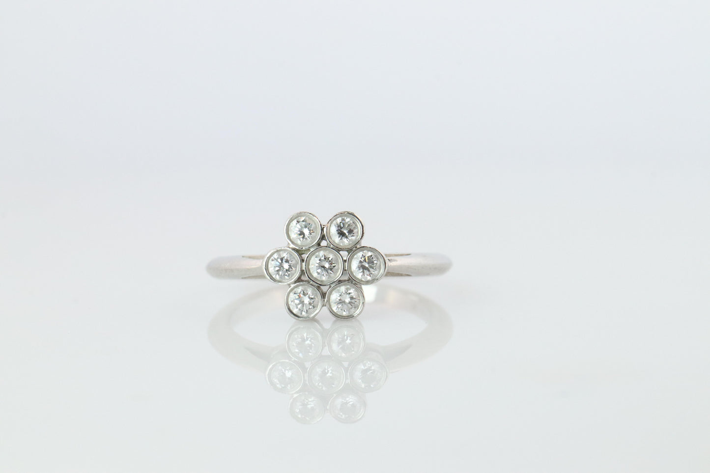 Tiffany and Co. Diamond Ring. Platinum Enchant Flower Diamond Band.