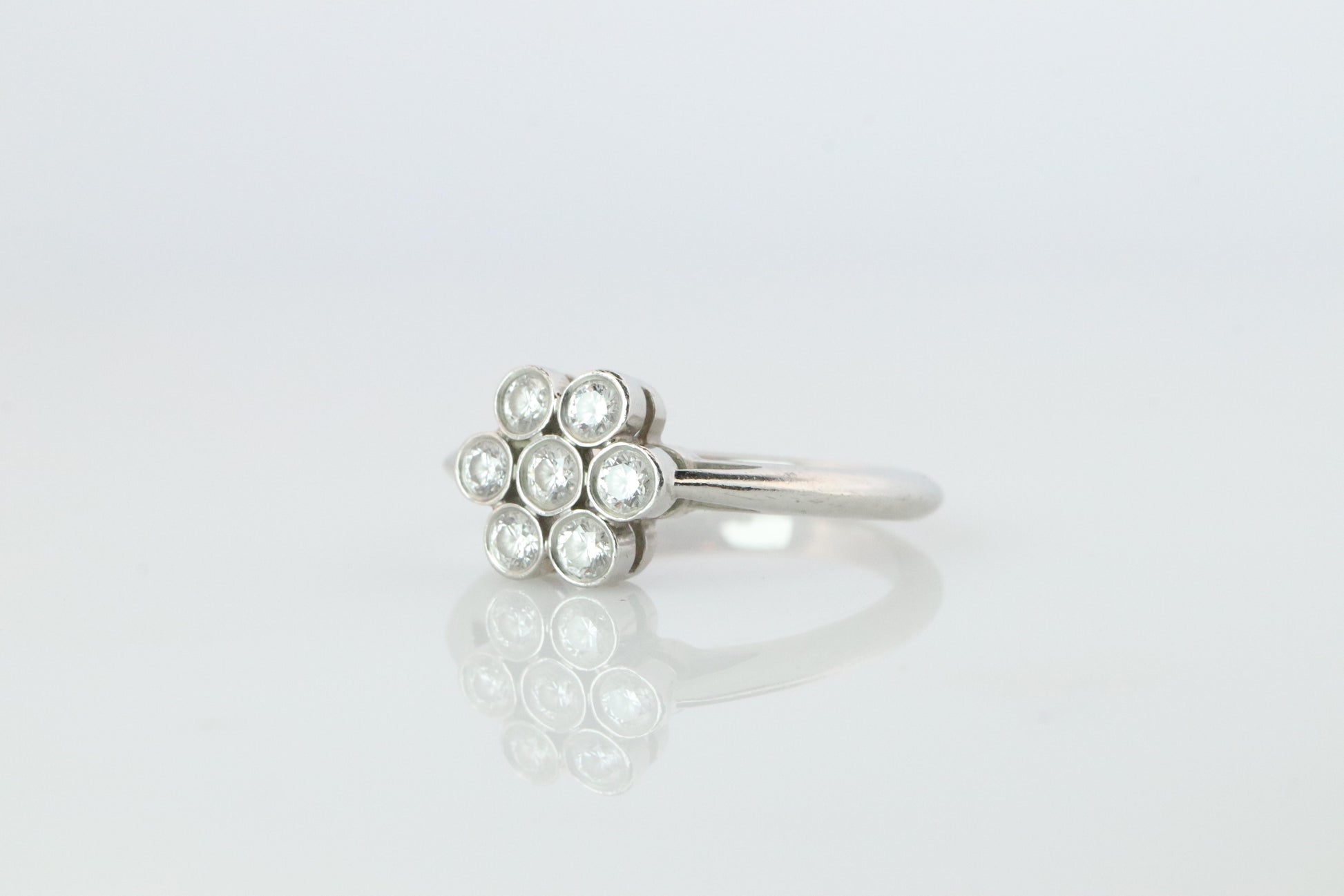 Tiffany and Co. Diamond Ring. Platinum Enchant Flower Diamond Band.