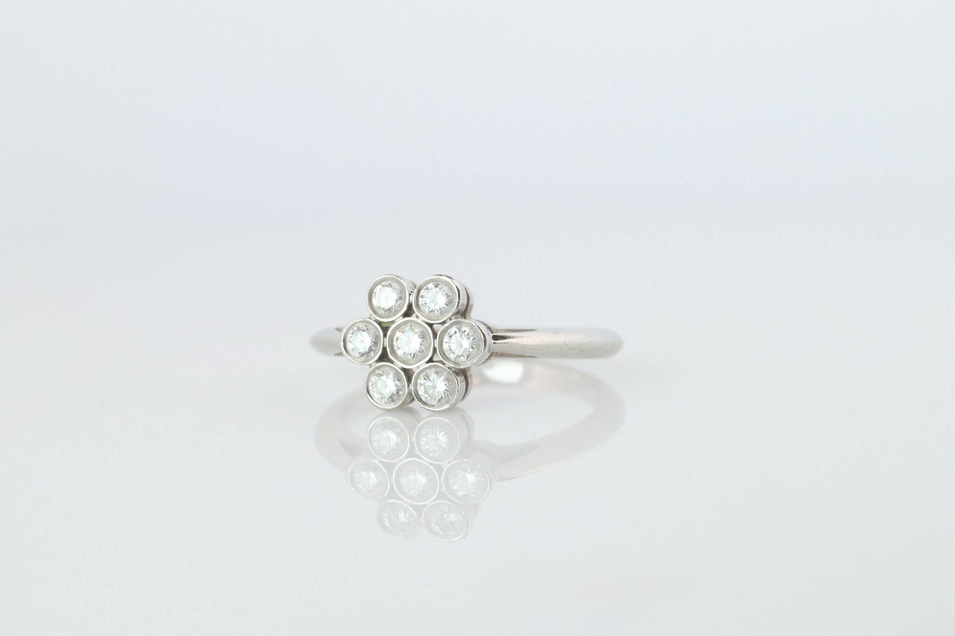 Tiffany and Co. Diamond Ring. Platinum Enchant Flower Diamond Band.