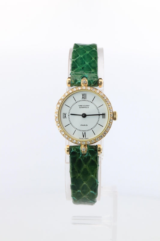 Van Cleef and Arpels 18901 B1 watch. 18k Gold VCA Classique Diamond Bezel.