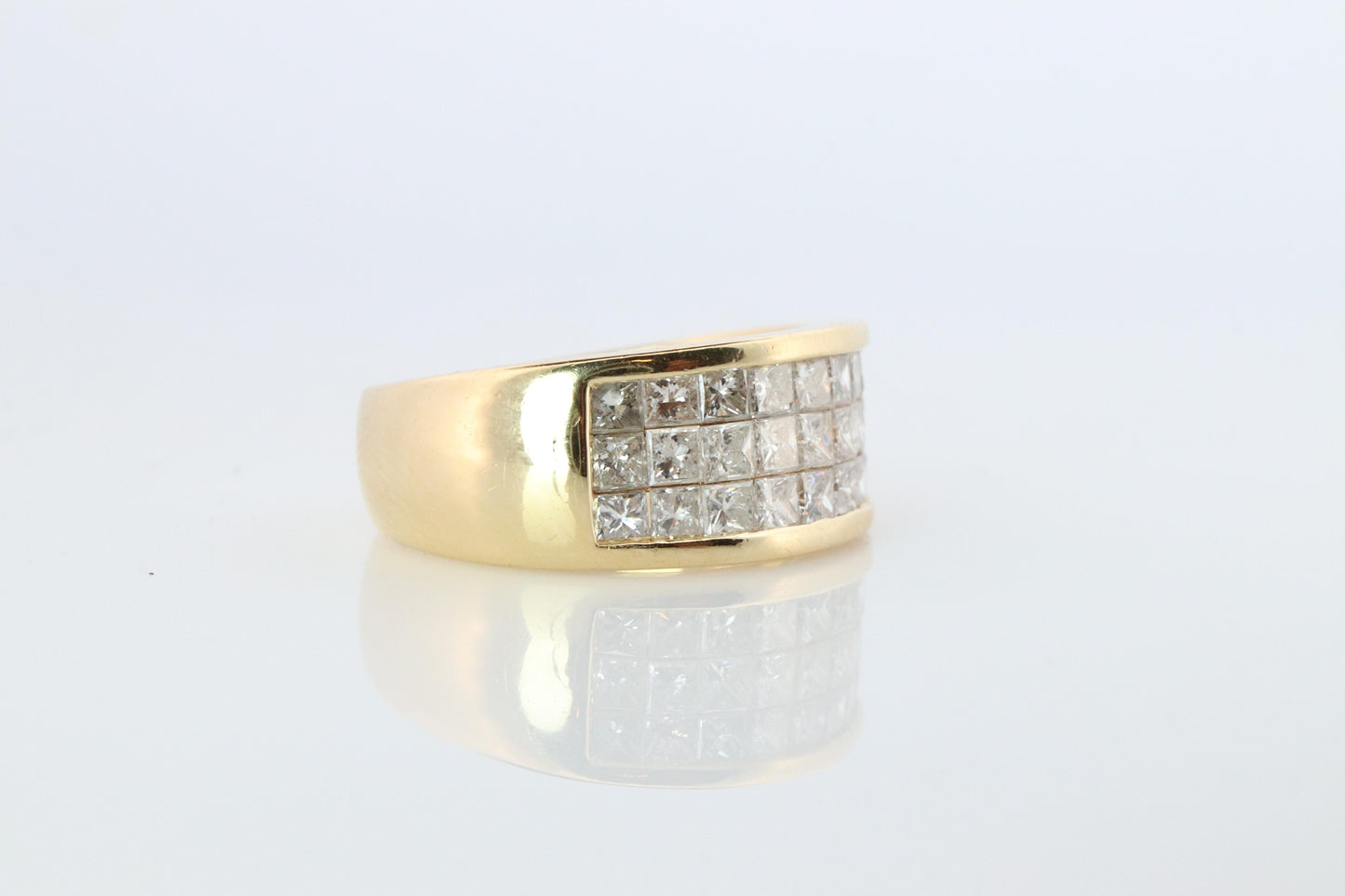 18k Diamond eternity band. 18k Yellow Gold Princess Cut Invisible Set ring.