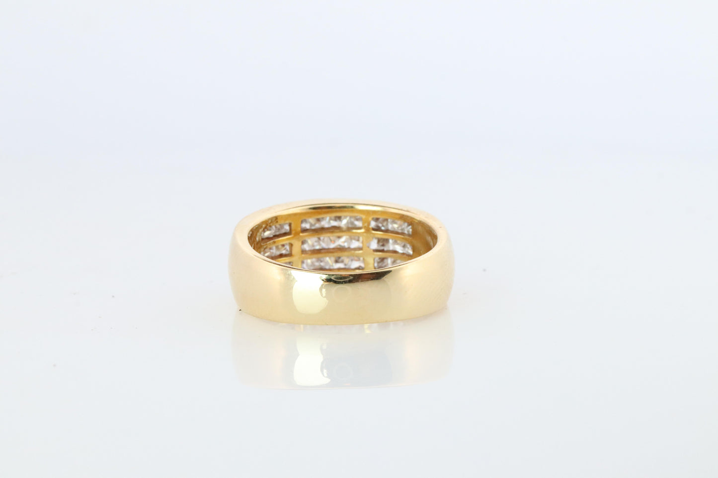18k Diamond eternity band. 18k Yellow Gold Princess Cut Invisible Set ring.