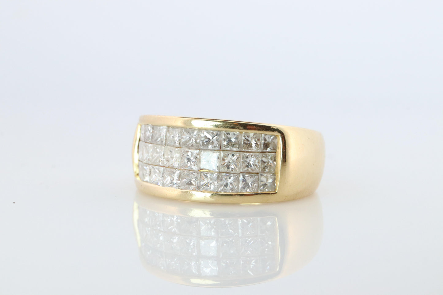 18k Diamond eternity band. 18k Yellow Gold Princess Cut Invisible Set ring.