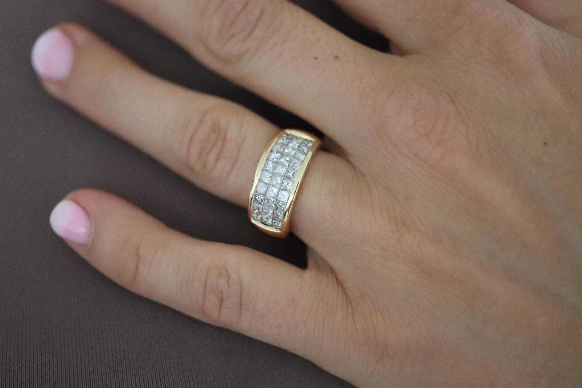18k Diamond eternity band. 18k Yellow Gold Princess Cut Invisible Set ring.