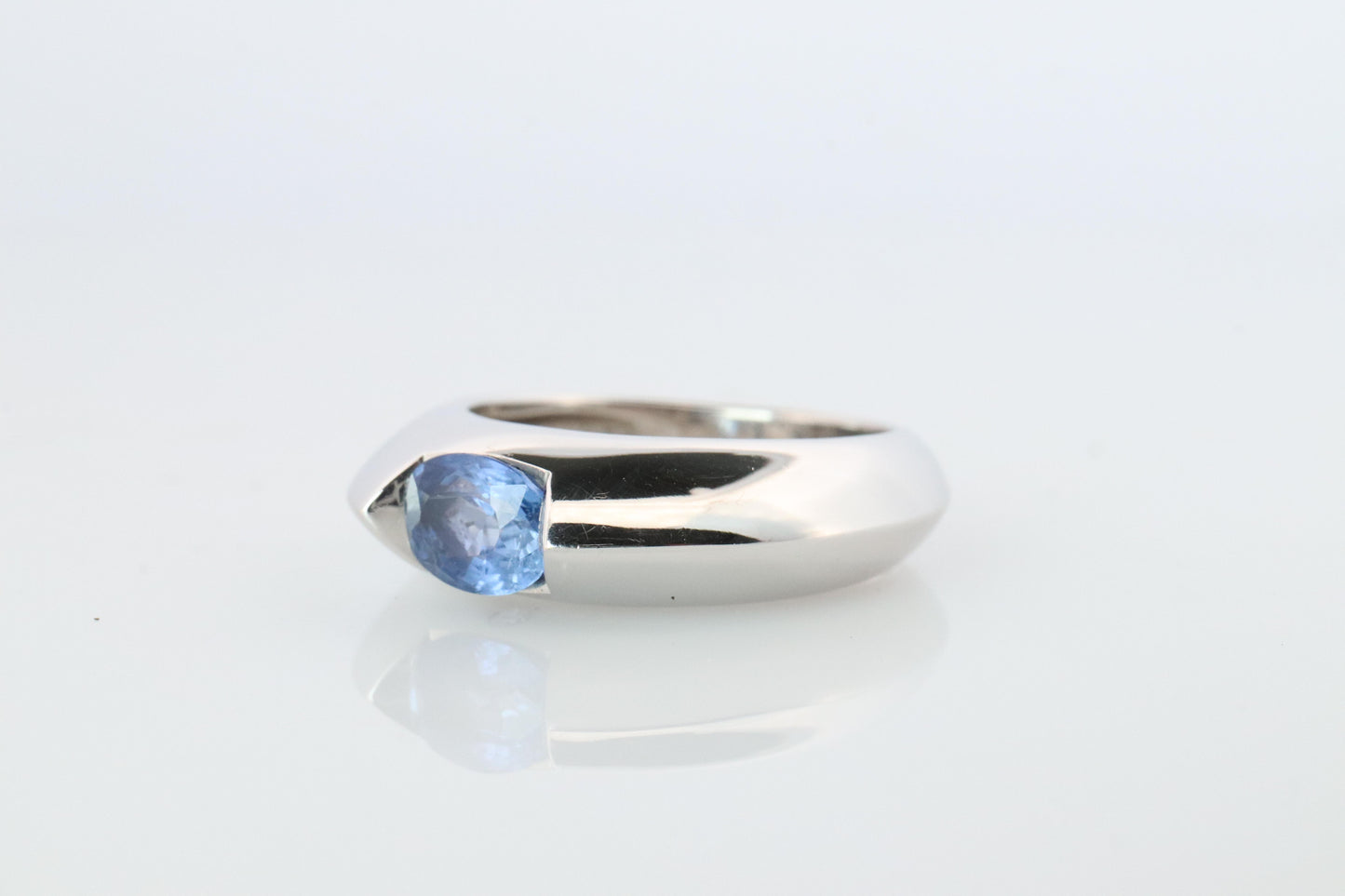 Genuine Piaget Oval Sapphire and Diamond Solitaire Ring. 18k White Gold Band