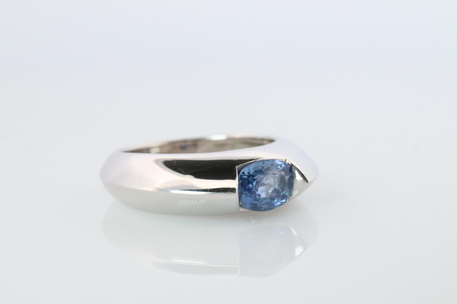 Genuine Piaget Oval Sapphire and Diamond Solitaire Ring. 18k White Gold Band