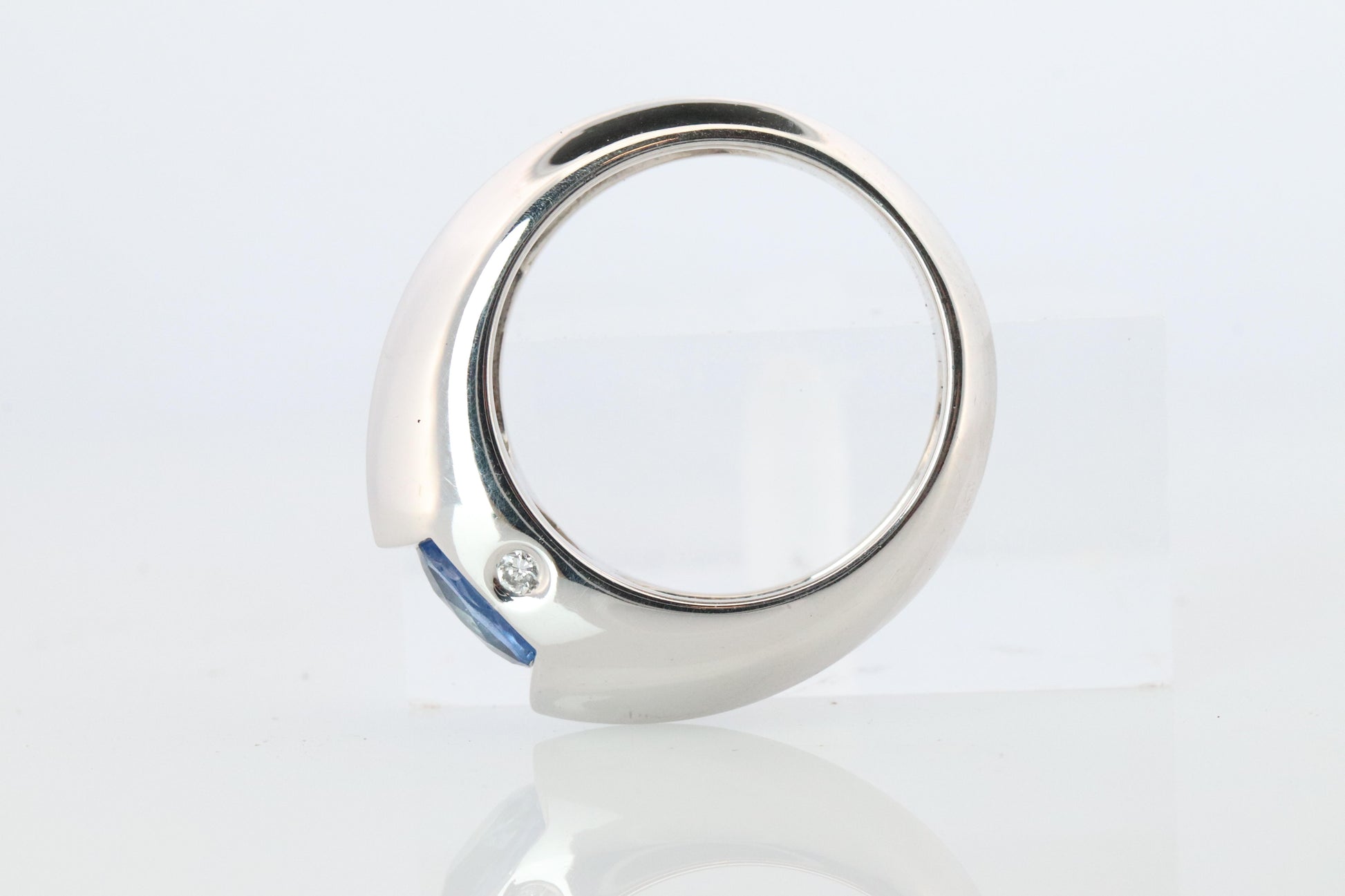 Genuine Piaget Oval Sapphire and Diamond Solitaire Ring. 18k White Gold Band