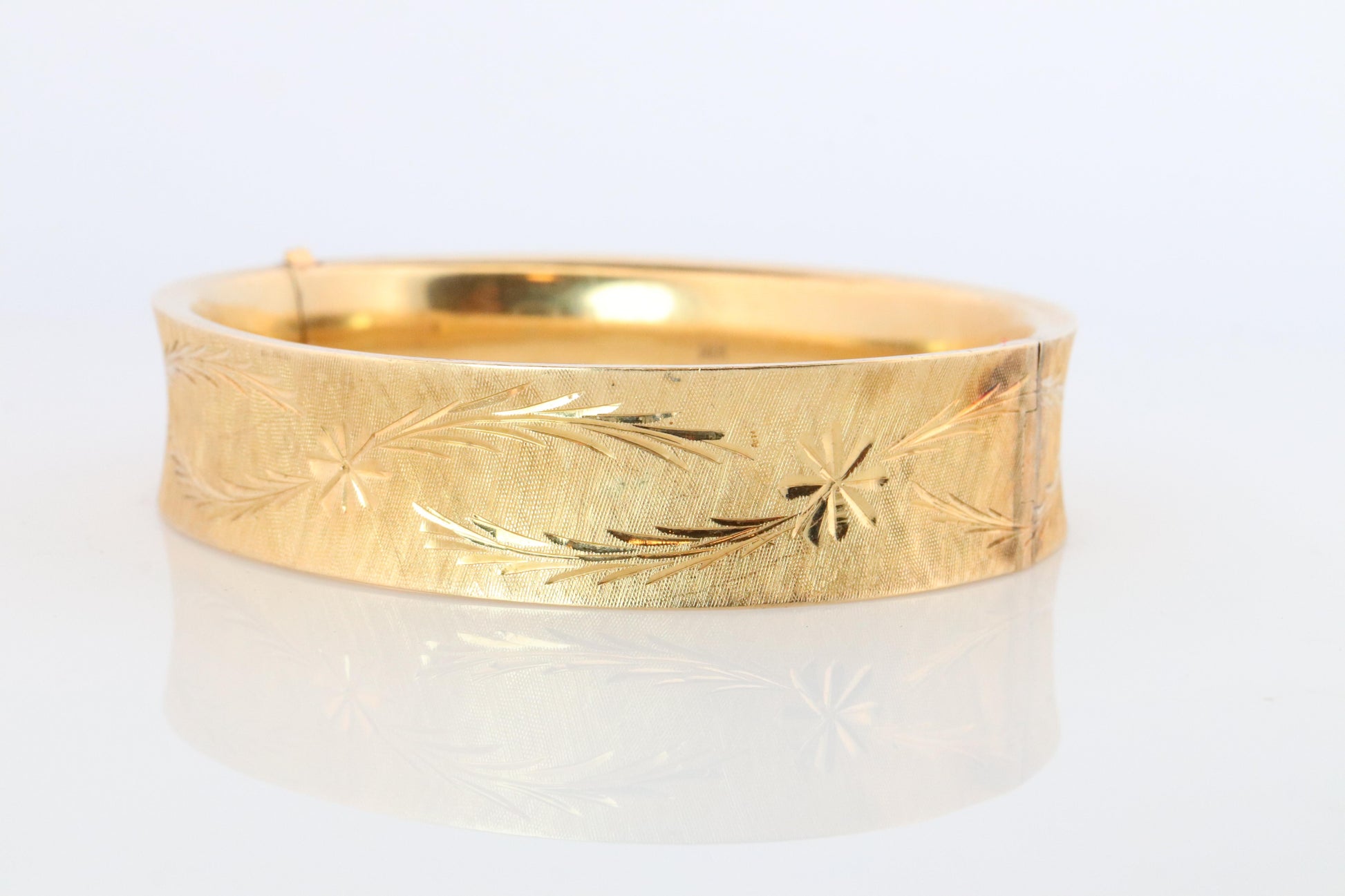 14k Bangle Bracelet. Hinged Hollow Bangle Bracelet Engraved with Leaves