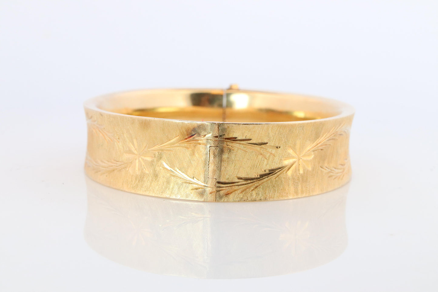 14k Bangle Bracelet. Hinged Hollow Bangle Bracelet Engraved with Leaves